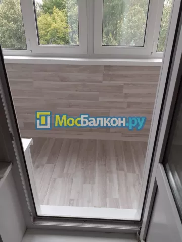 Отделка балконов ламинатом в Москве цены под ключ от МосБалкон