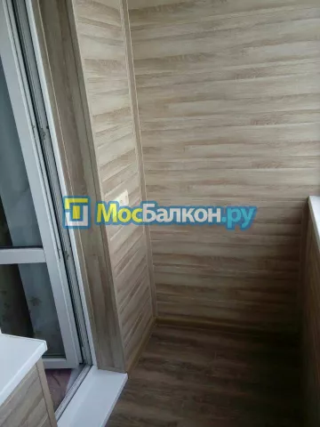 Отделка балкона и лоджии пластиковыми ПВХ панелями в Раменском от компании МосБалкон