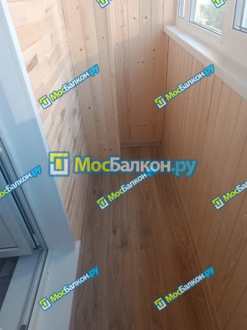 Отделка балконов деревянной вагонкой в Москве